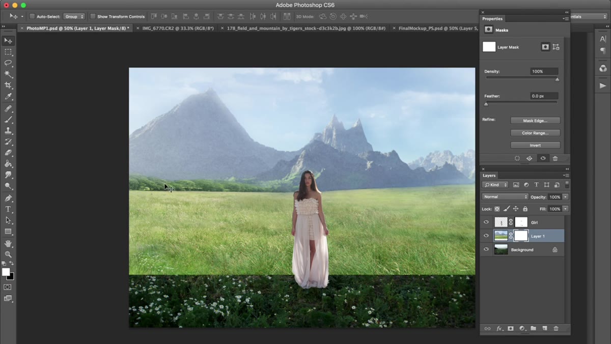 Layer mask being painted to reveal mountains, hide lower portion