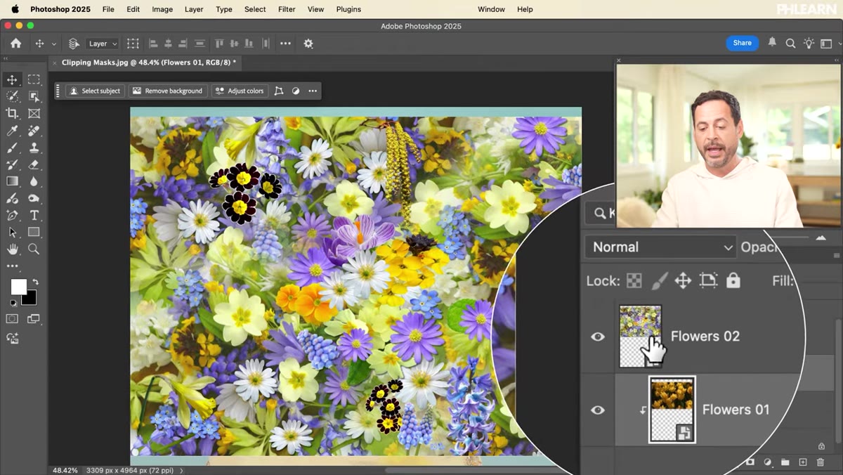 Second flower layer being alt-clicked to clip, both images now inside text