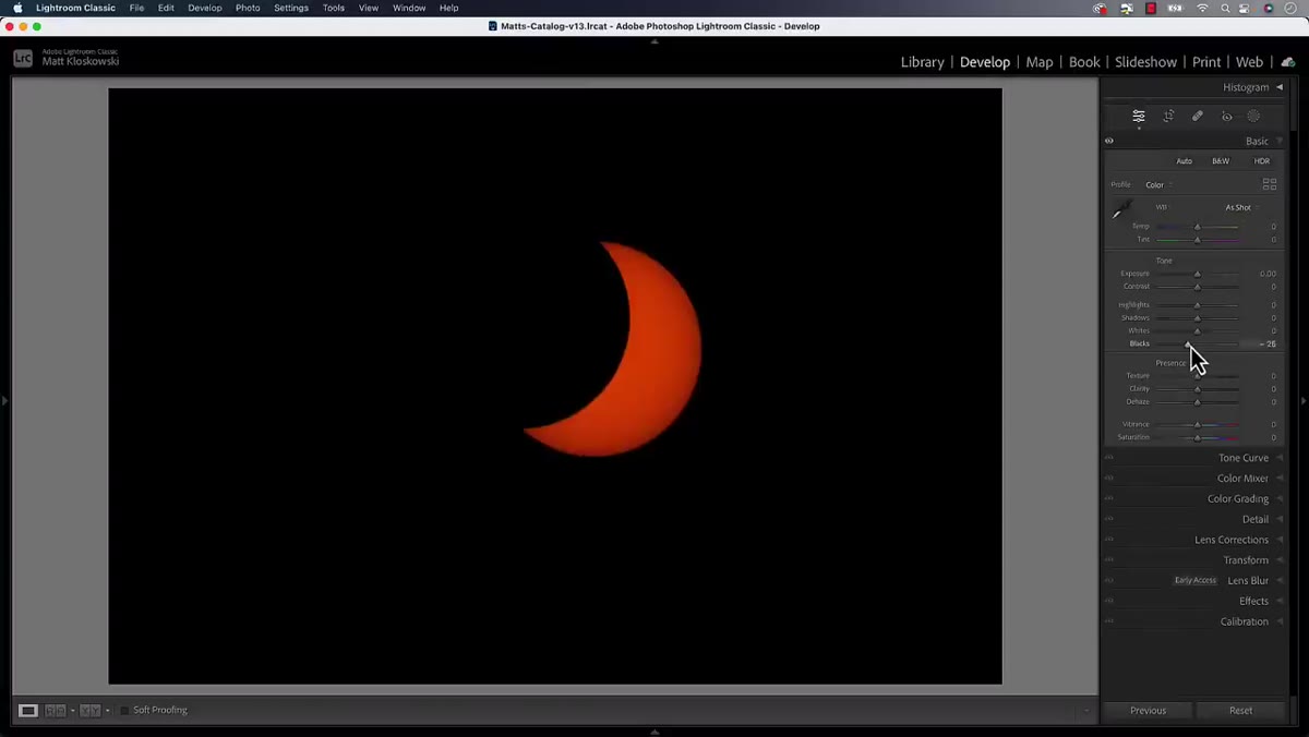 caption: Adjusting the black slider in a raw editing panel