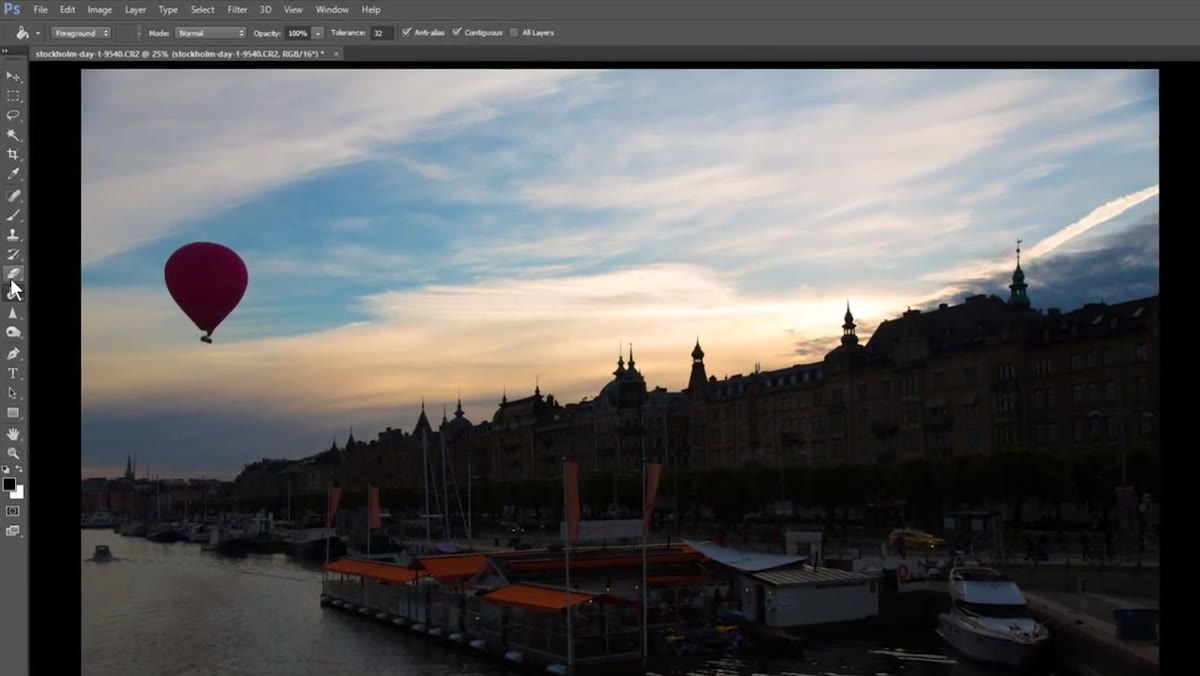 Eraser tool actively removing pixels from the top layer